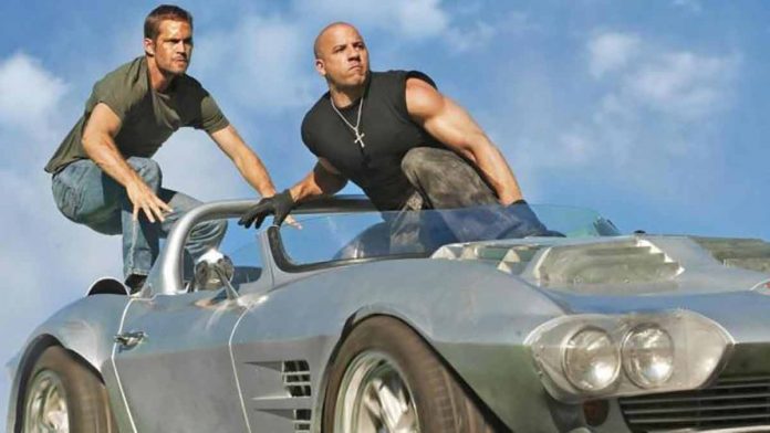 Paul Walker e Vin Diesel em Velozes e Furiosos 5 (foto: reprodução/ Universal Studios)